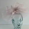 Crin fascinator with feather flower in orchid