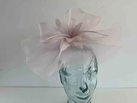 Crin fascinator with feather flower in orchid